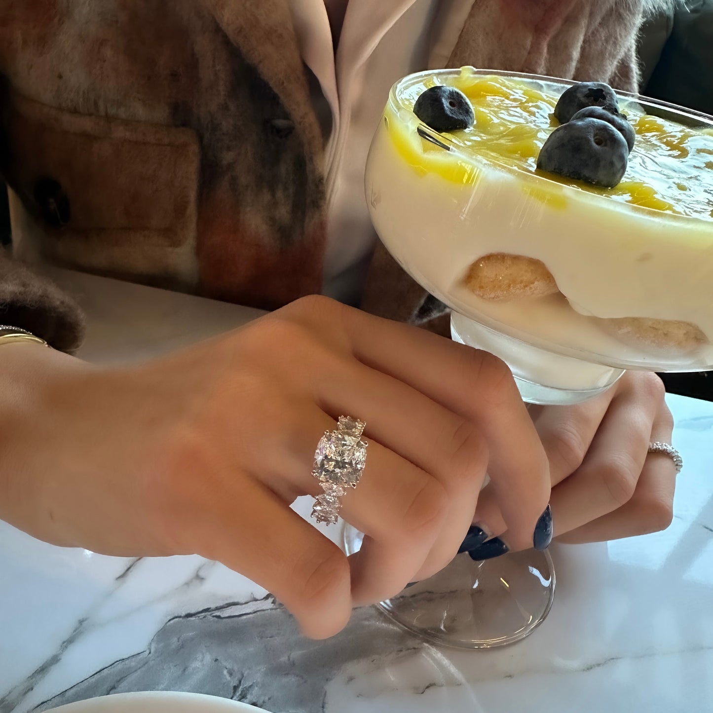 Moissanite Ring with Marquise Stone on Sides