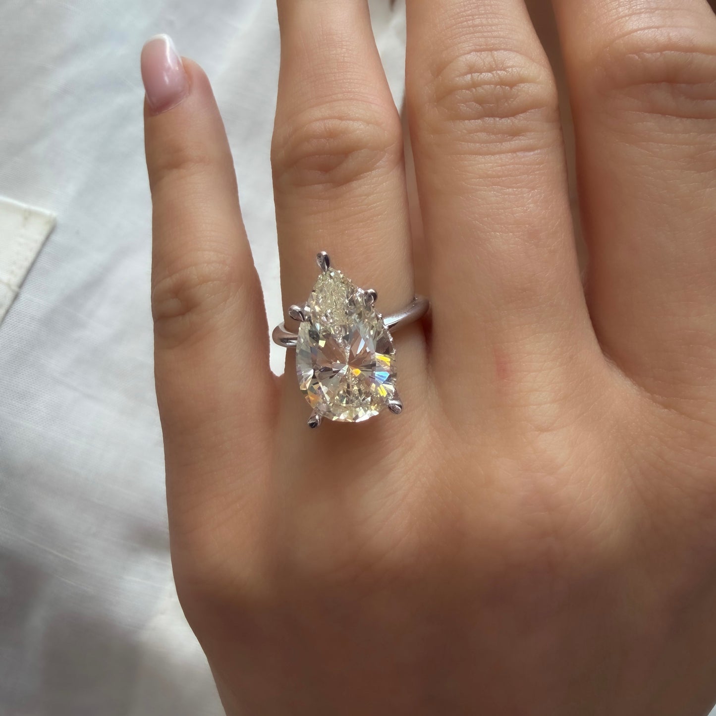 G-Color Pear Ring with Stone Setting