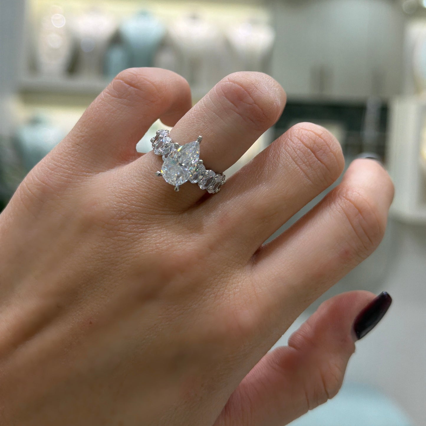 Oval Moissanite Ring with Teardrop-Shaped Arm