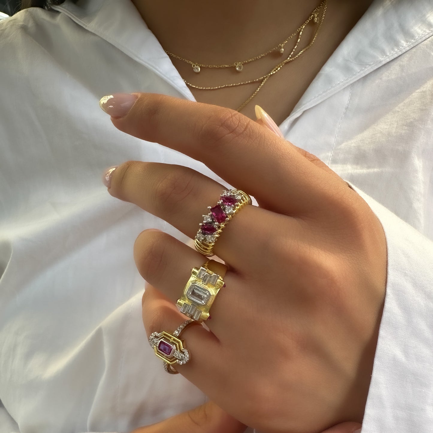 Ring with Fuchsia Stone on Sides