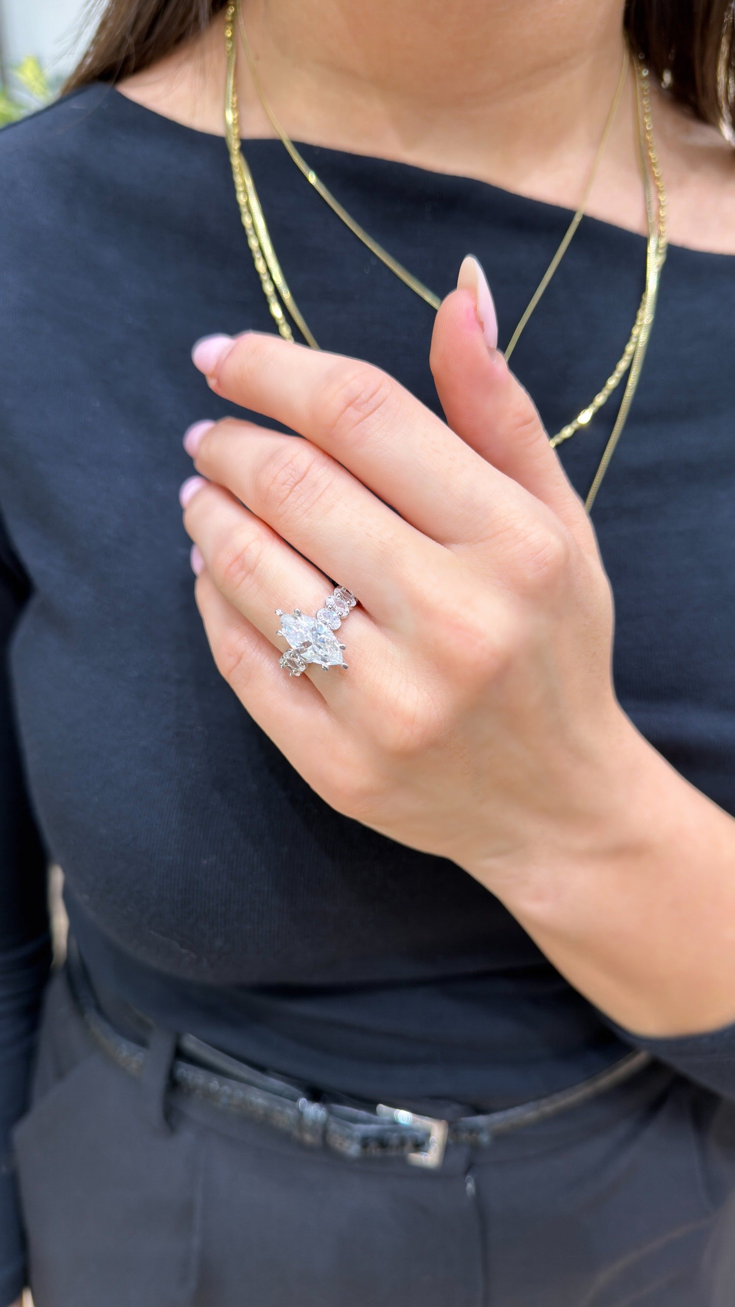 Marquise Moissanite Ring with Oval Stones on the Band