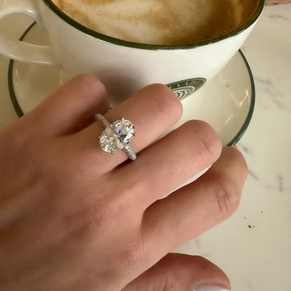 Oval Moissanite Ring with Side Stones