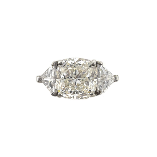 Moissanite Ring with Triangular Stones on Sides