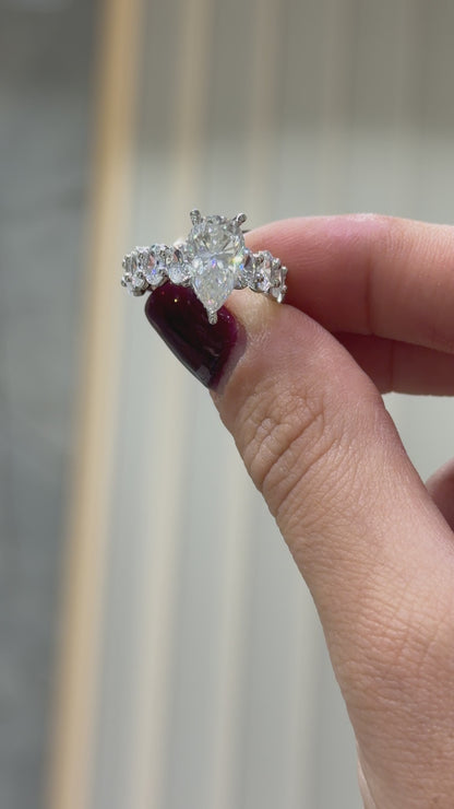 Oval Moissanite Ring with Teardrop-Shaped Arm